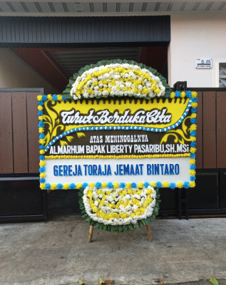 Papan Bunga Duka di Lumo